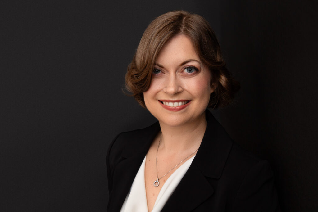 Professional headshot of a woman from a brand experience session with Redhead Creative Media in Chapel Hill, NC.