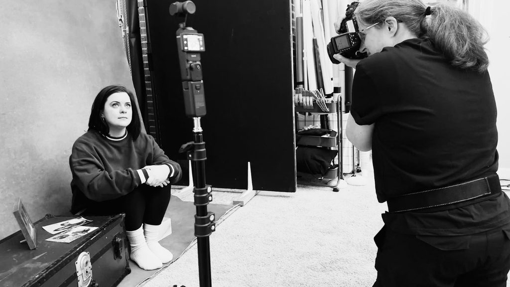 Stop Chasing Headhots & Start Documenting Your Life Behind-the-Scenes image of Jennifer working with a client during a Postpartum Project session at Redhead Creative Media in Chapel Hill, North Carolina.